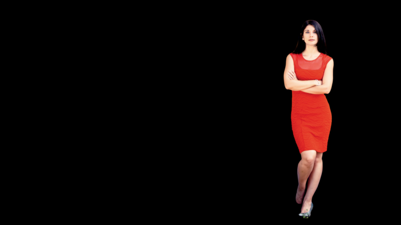 Image of Mary Anne Franks wearing a red dress against a black background