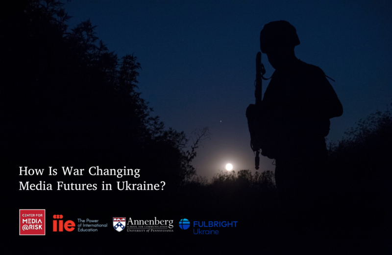 The image shows a silhouette of a soldier holding a rifle against a dark blue night sky with the moon partially visible near the horizon. The background includes some trees and bushes. There are several logos at the bottom left corner, including "Center for Media at Risk," "IIE: The Power of International Education," "Annenberg School for Communication University of Pennsylvania," and "Fulbright Ukraine." The text on the image reads: "How Is War Changing Media Futures in Ukraine?"