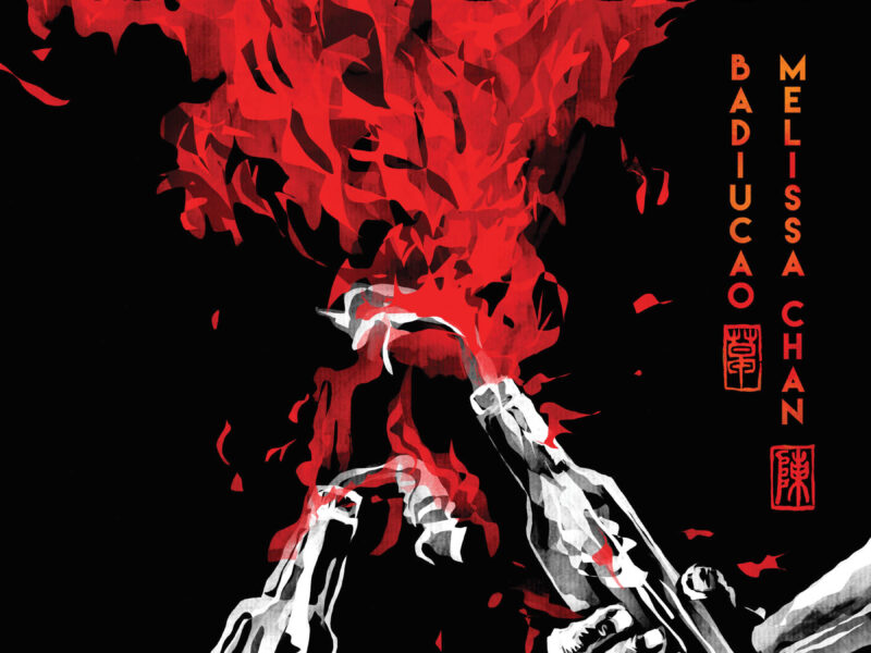 Book cover for graphic novel, "you must take part in the revolution". Title in yellow lettering on black background. Red flames and hands holding bottles in the foreground.